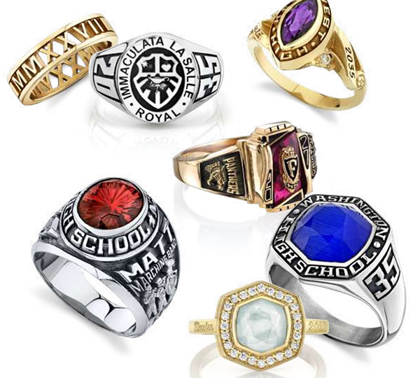 A collection of seven distinct high school and class rings with different gemstones, designs, and engravings, arranged on a white background.